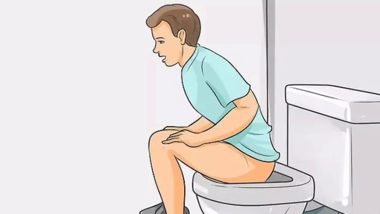 Мужчина сидит в туалете. Сидит на унитазе. Правильная поза для дефекации.